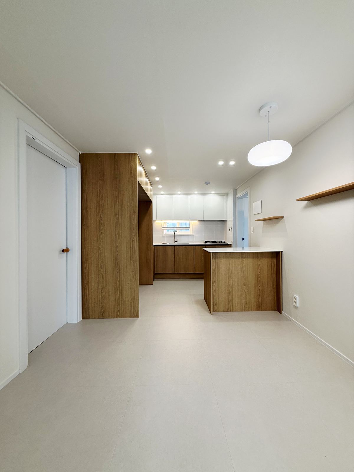 Style reference: kitchen with wood cabinetry and island