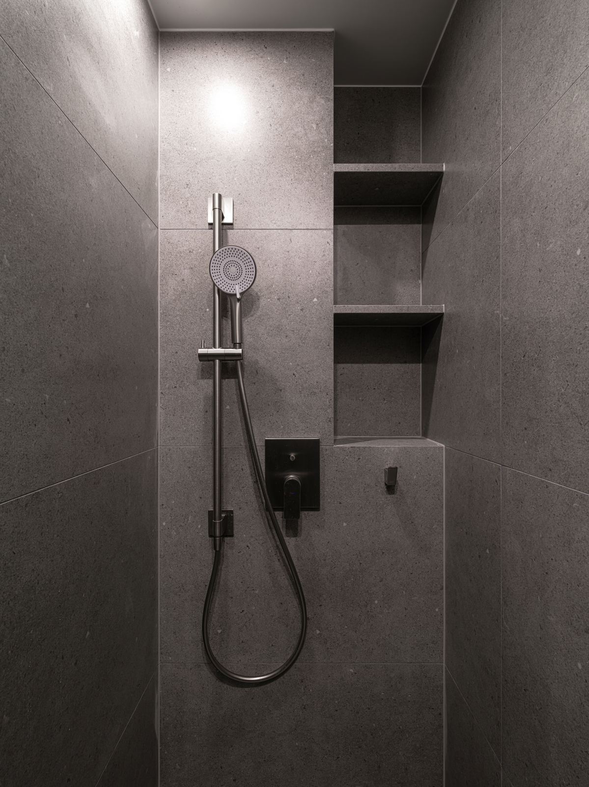 Style reference: a stone-tiled shower with built-in niche shelving